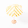 Maileg yellow and white stripe beach umbrella on wooden stand | © Conscious Craft